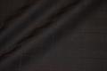 Jacquardvævet uld med tern - sort